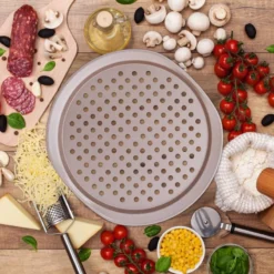 Plaque à Pizzas Ronde Perforée Lot De 2 -Le Coin Cuisine 94d1ac57809e45df9e0b8eaa474b4447